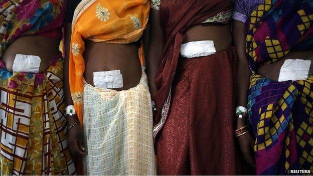 Women, who underwent sterilisation surgery at a government mass sterilisation camp, at a hospital in Bilaspur district in Chhattisgarh November 14, 2014.