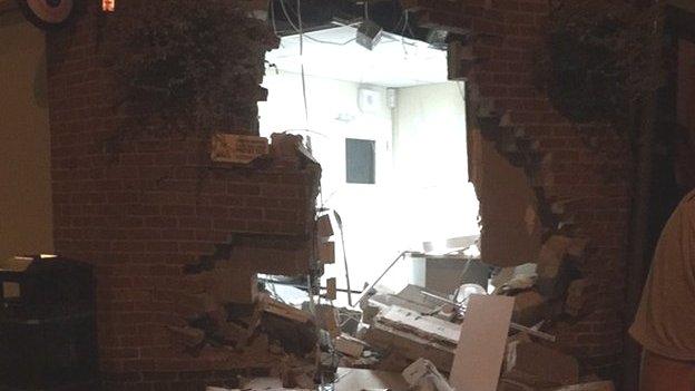 A hole in the side of the Co-op food store in Sapcote, Leicestershire