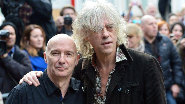 Midge Ure and Bob Geldof arriving for BANDAID30 recording