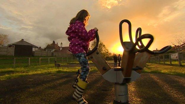 A child in a playground at Maesglas, Cardigan