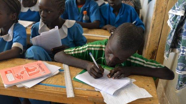 Children attend classes on 13 November 2014 in a UNHCR camp for Nigerian refugees in Minawao, in the extreme north-west of Cameroon