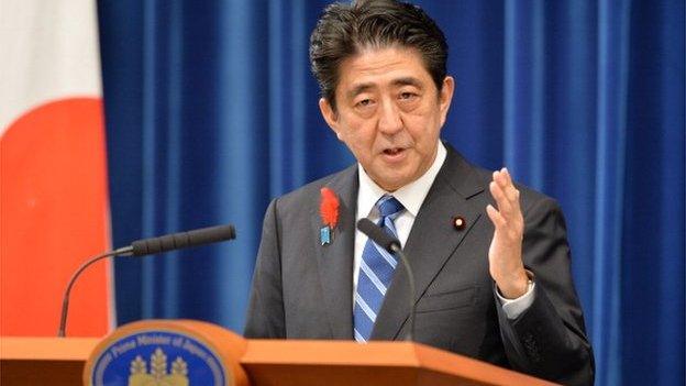 Japanese Prime Minister Shinzo Abe speaks during a press conference at his office in Tokyo on 1 October 2013.