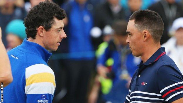 Rory McIlroy and Rickie Fowler shake hands after the Northern Ireland player wins their single match at the Ryder Cup in September