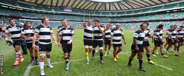 Barbarians celebrate after beating England in June 2014