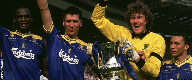Lawrie Sanchez (second left) celebrates with Eric Young (left) and keeper Dave Beasant after Wimbledon beat Liverpool to win the FA Cup in 1988