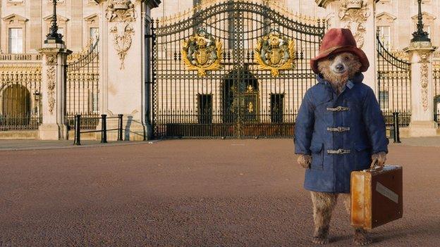 Paddington bear outside Buckingham Palace