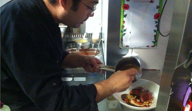 Food is prepared at Christian Etchebest's restaurant La Cantine du Troquet Dupleix