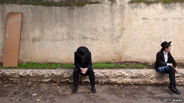 Ultra Orthodox Jewish men are seen during the funeral of Rabbi Moshe Twersky on November 18, 2014 in Jerusalem, Israel.