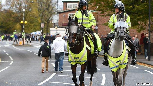 Mounted police outside Loftus Road football ground on 8 November 2014