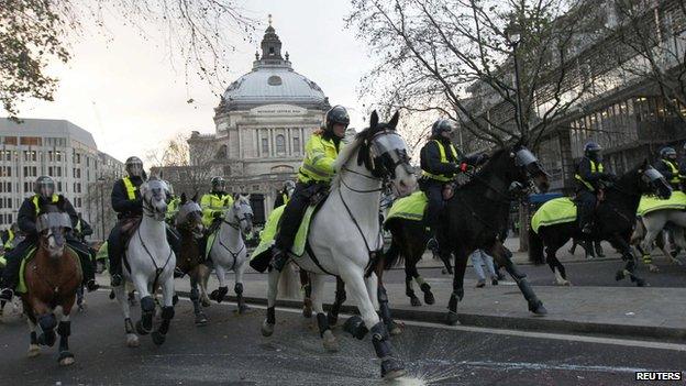 Mounted police at tuition fees demo in central London in December 2010