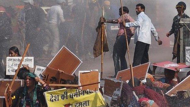 Rampal supporters confronting police