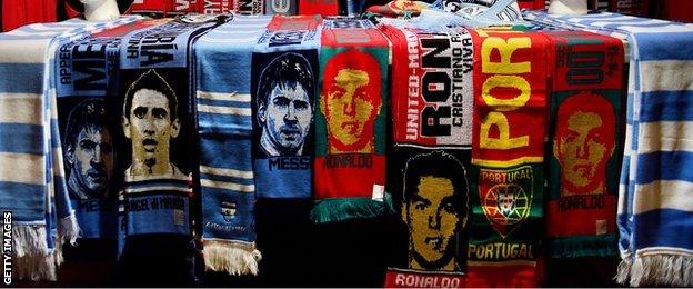 Lionel Messi and Cristiano Ronaldo scarves on sale at Old Trafford