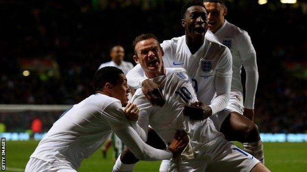 Wayne Rooney celebrates his second goal in England's 3-1 win at Celtic Park