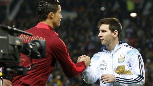 Cristiano Ronaldo and Lionel Messi shake hands before kick-off