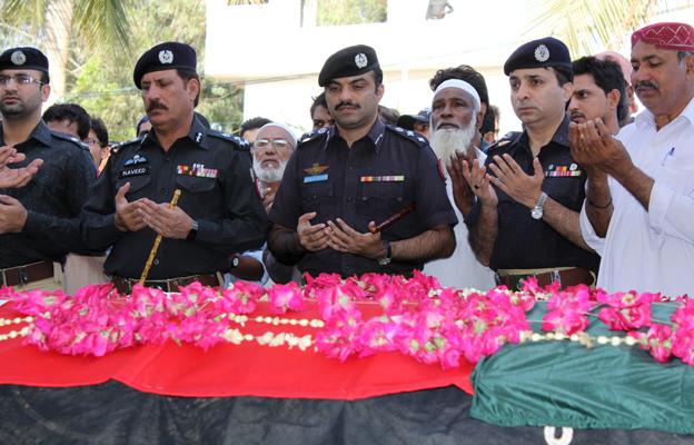 Police officers at a colleague's funeral