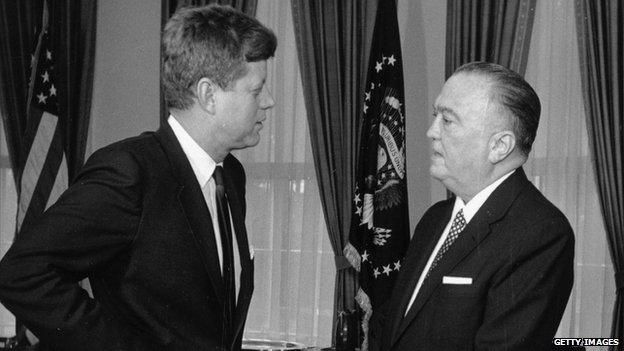 FBI Director J Edgar Hoover speaks with President John F Kennedy in 1961.