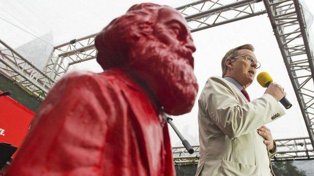 Bodo Ramelow file pic - with bust of Karl Marx beside him