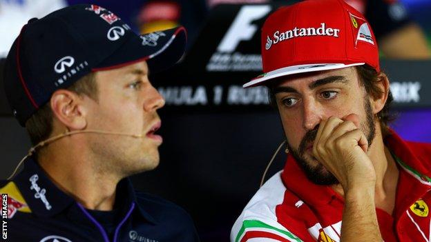 Vettel and Alonso at Thursday's news conference in Abu Dhabi