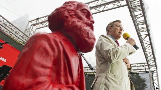 Bodo Ramelow file pic - with bust of Karl Marx beside him