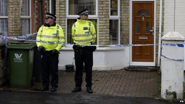 Police officers outside a house in Desborough Avenue, High Wycombe after four men were arrested in connection with an alleged Islamist terror plot.