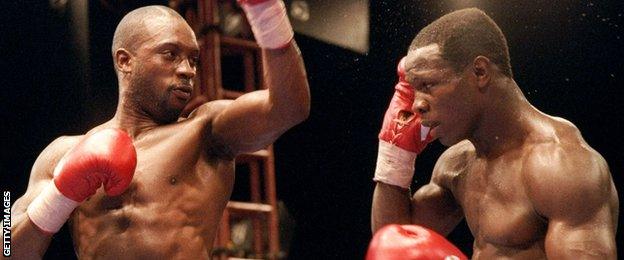 Nigel Benn and Chris Eubank trade blows during their fight in 1993