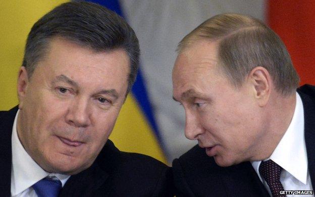 At a December signing ceremony with Mr Yanukovych, Russia's President Putin (R) slashed gas prices for Ukraine