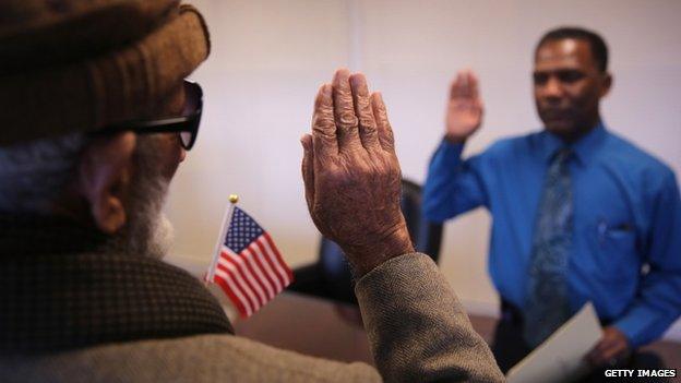 An immigrant took the US citizenship oath in Newark, New Jersey, on 20 November 2014