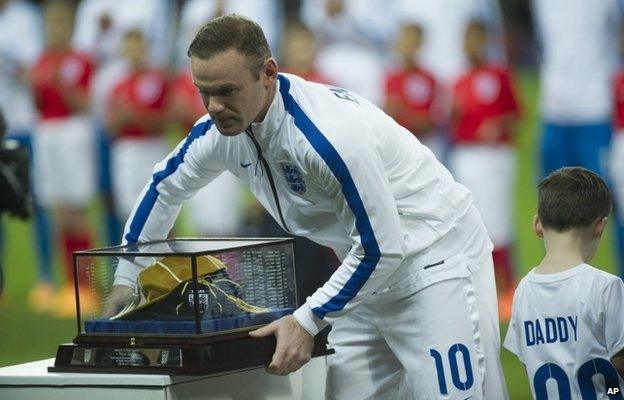 Wayne Rooney receiving his 100th cap