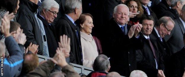 Dave Whelan was applauded to his seat by fans in the Wigan sections of the ground