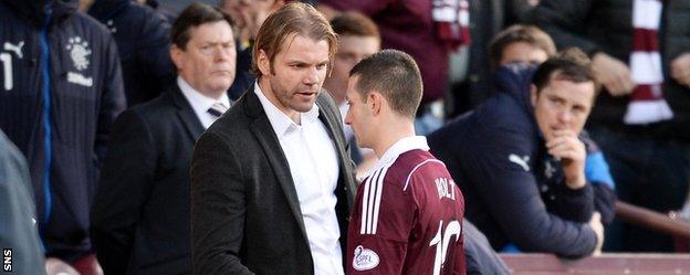 Hearts head coach Robbie Neilson and midfielder Jason Holt