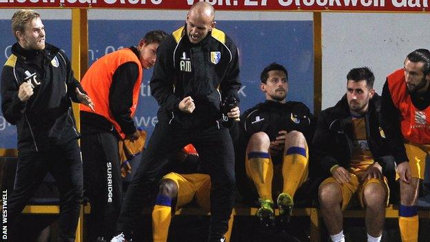 Adam Murray celebrates