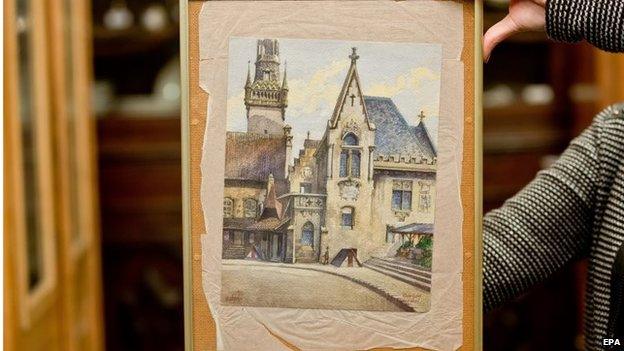 The watercolour painting "Altes Rathaus" which was supposedly painted by Adolf Hitler, is shown at an auction house in Nuremberg, Germany, 20 November 2014