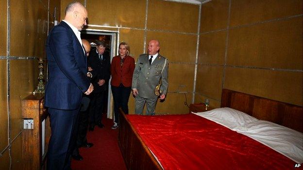 Albanian Prime Minister Edi Rama, left, looks at the bedroom of late communist dictator Enver Hoxha at a bunker built in Tirana - 22 November 2014