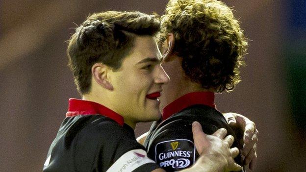 Edinburgh's Sam Hidalgo-Clyne congratulates try scorer Andries Strauss