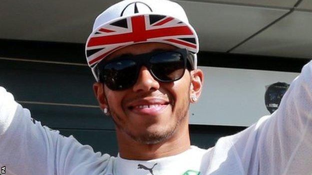 Lewis Hamilton celebrates winning the the 2014 British Grand Prix at Silverstone Circuit,