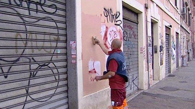 Graffiti being cleaned in Rome