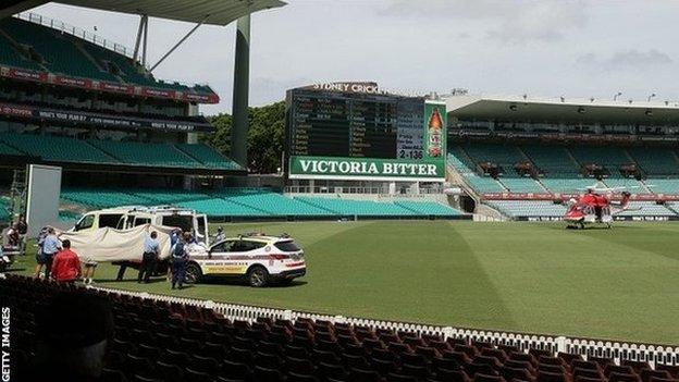 Ambulance on the pitch at Sydney cricket ground (25 Nov 2014)