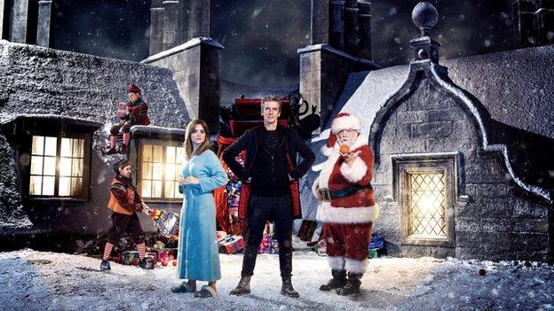 Doctor Who stars Jenna Coleman and Peter Capaldi with Father Christmas here played by Nick Frost