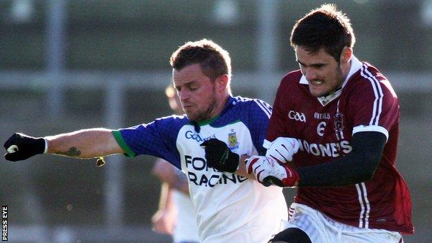 Ballinderry's Raymond Wilkinson and Slaughtneil's Chrissy McKaigue