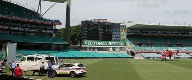 Ambulance on the pitch at Sydney cricket ground (25 Nov 2014)