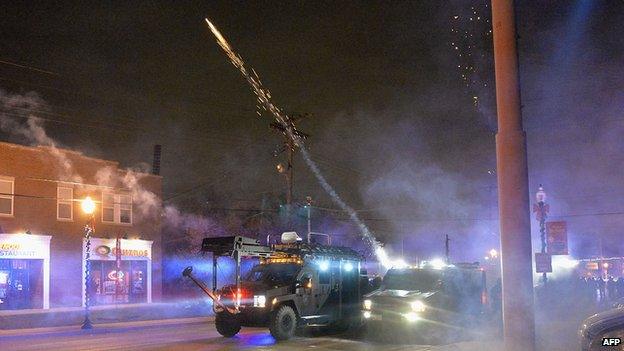 A tear gas canister being launched