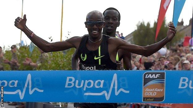 Mo Farah celebrates winning the Great North Run in Gateshead