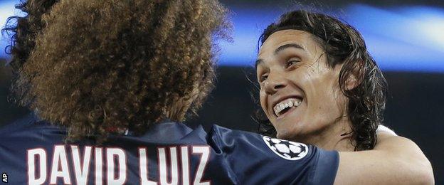 Paris St-Germain's Edinson Cavani celebrates scoring against Ajax