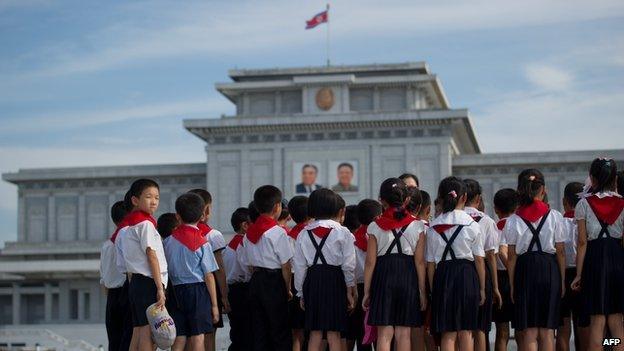 North Korean school children at the Kumsusan Palace of the Sun mausoleum in Pyongyang