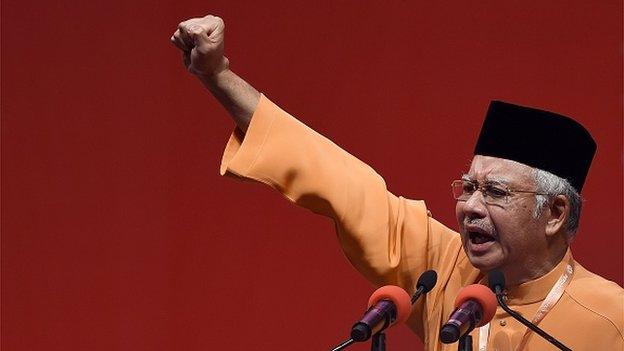 Malaysian Prime Minister Najib Razak addresses delegates during the annual congress of his ruling party, the United Malays National Organisation (UMNO) in Kuala Lumpur on November 27, 2014