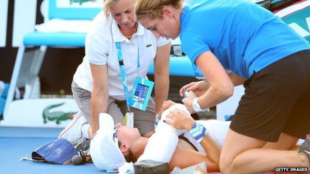 A player is attended to at the Australian Open