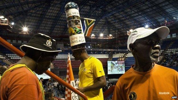 Fans arrive during a memorial service in Johannesburg on 30 October 2014 fort slain Bafana Bafana and Orlando Pirates goalkeeper Senzo Meyiwa