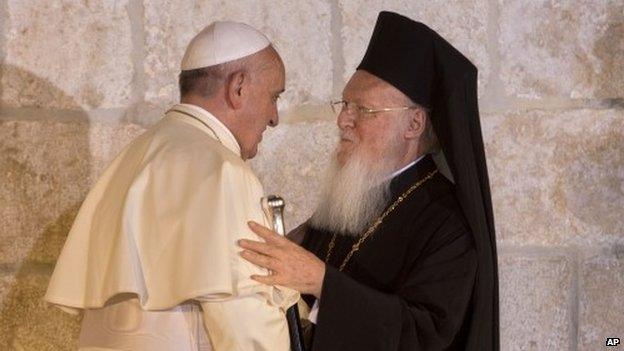 May 25, 2014 Pope Francis stands with Ecumenical Patriarch Bartholomew I as they meet outside the Church of the Holy Sepulchre, in Jerusalem