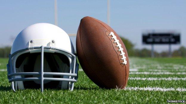 An American football and helmet