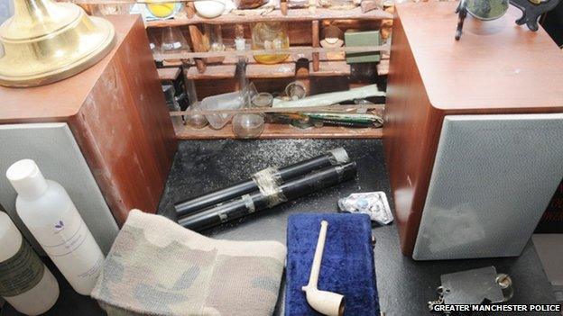 Ryan McGee's desk showing chemicals and other items